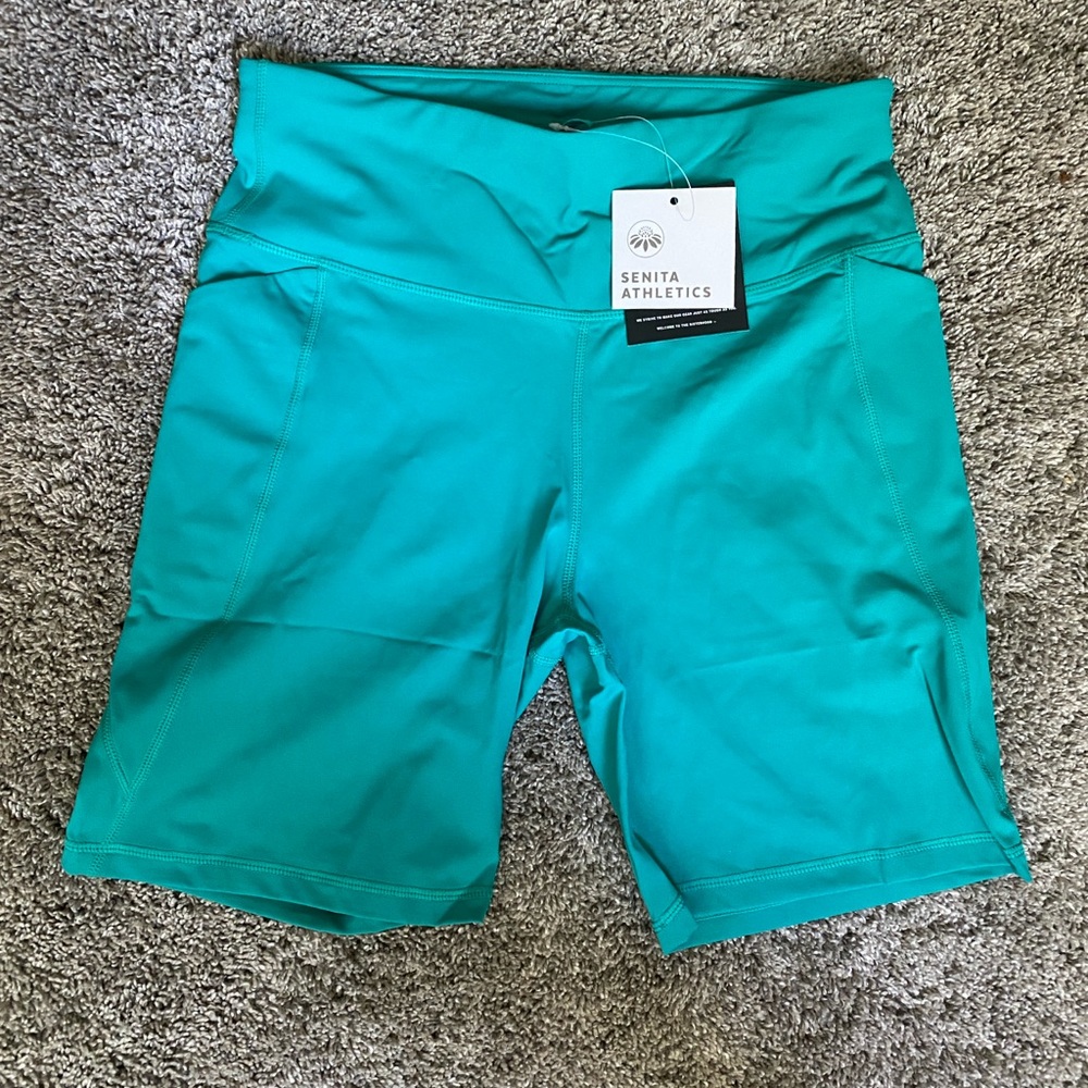 Senita Athletics Teal Swim Biker Shorts with side pockets - NWT size M